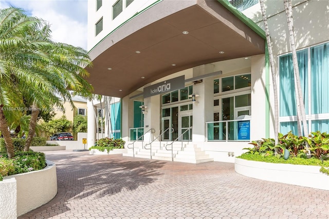 2889 Mcfarlane Rd Unit 1403, Miami, FL 33133 - property entrance featuring stucco siding