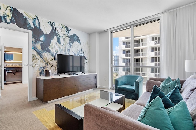 17315 Collins Ave Unit 1008, Sunny Isles Beach, FL 33160 - carpeted living area featuring baseboards and a wall of windows