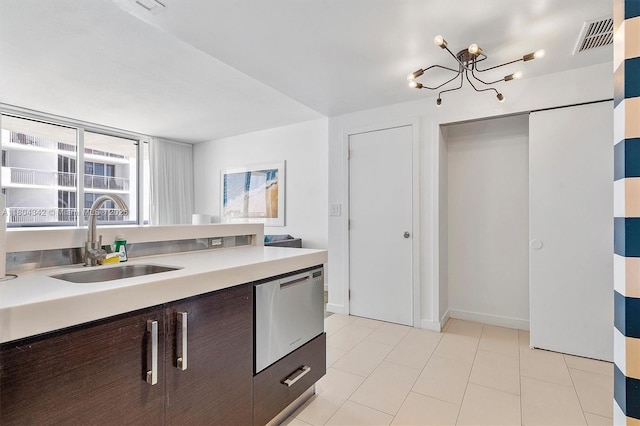 17315 Collins Ave Unit 1008, Sunny Isles Beach, FL 33160 - kitchen featuring a sink, light countertops, dark brown cabinetry, a chandelier, and dishwasher