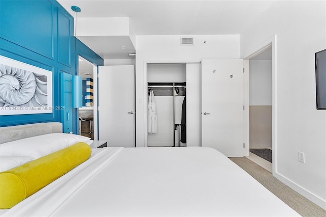 17315 Collins Ave Unit 1008, Sunny Isles Beach, FL 33160 - carpeted bedroom with a closet and baseboards