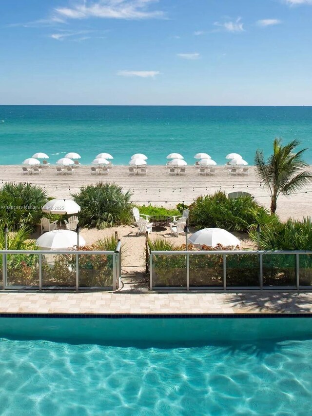 17315 Collins Ave Unit 1008, Sunny Isles Beach, FL 33160 - swimming pool featuring a water view