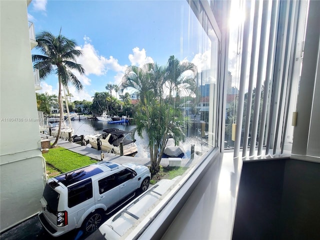 16565 NE 26th Ave Unit 2B, North Miami Beach, FL 33160 - balcony featuring a water view and a dock