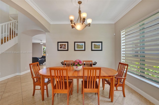 4470 E Seneca Ave, Weston, FL 33332 - dining room featuring light tile patterned floors, crown molding, stairs, arched walkways, and a chandelier