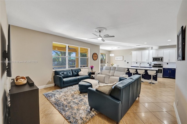4470 E Seneca Ave, Weston, FL 33332 - living area featuring light tile patterned flooring and ceiling fan