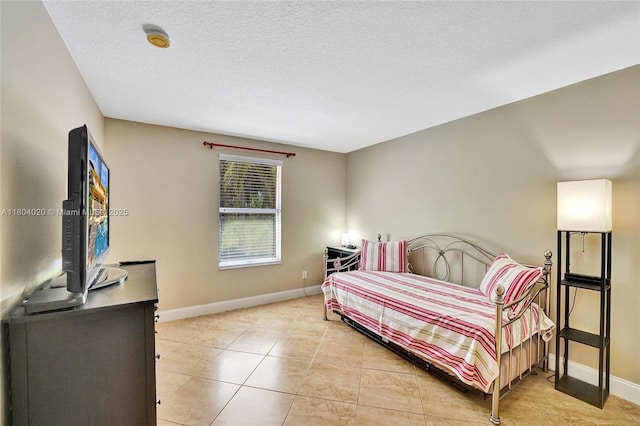 4470 E Seneca Ave, Weston, FL 33332 - bedroom with light tile patterned floors and a textured ceiling
