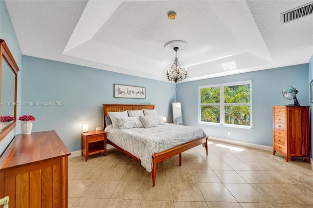 4470 E Seneca Ave, Weston, FL 33332 - bedroom featuring a tray ceiling, a chandelier, a textured ceiling, and light tile patterned floors