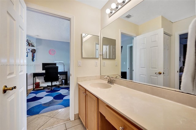 4470 E Seneca Ave, Weston, FL 33332 - bathroom with vanity and tile patterned floors