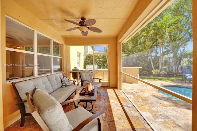 4470 E Seneca Ave, Weston, FL 33332 - sunroom / solarium featuring a ceiling fan, an outdoor living space, and stone finish flooring