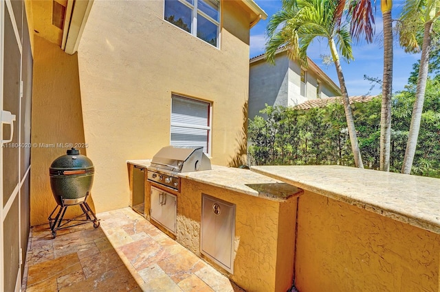 4470 E Seneca Ave, Weston, FL 33332 - view of patio / terrace featuring an outdoor kitchen