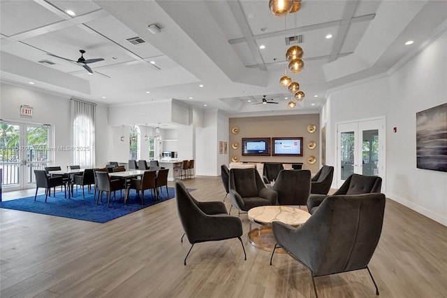4470 E Seneca Ave, Weston, FL 33332 - living room with french doors, a tray ceiling, ceiling fan, light wood finished floors, and recessed lighting