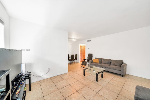 1530 Pennsylvania Ave Unit 203, Miami Beach, FL 33139 - living room featuring light tile patterned floors