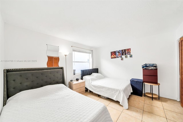 1530 Pennsylvania Ave Unit 203, Miami Beach, FL 33139 - bedroom featuring light tile patterned floors