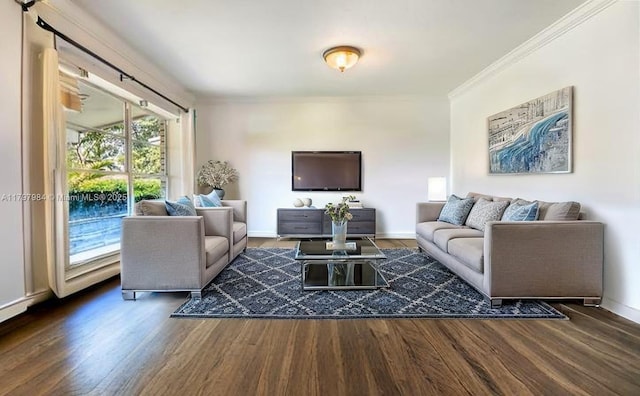 232 SE 6th St, Dania Beach, FL 33004 - living room featuring ornamental molding, wood finished floors, plenty of natural light, and baseboards
