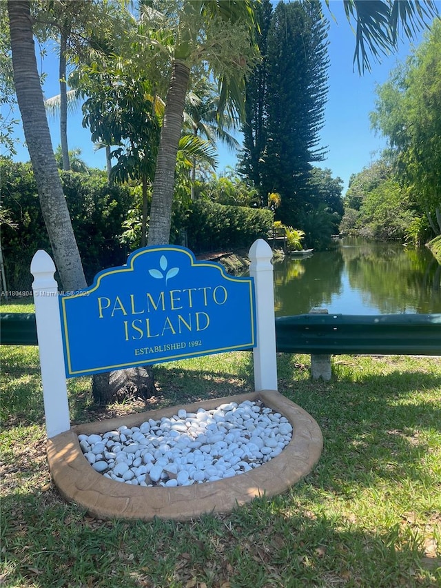 13000 SW 69th Ct, Pinecrest, FL 33156 - community / neighborhood sign featuring a water view