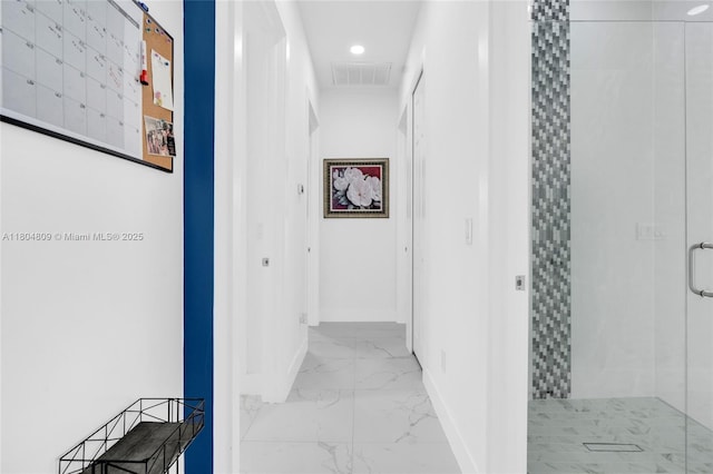 1020 Rush Ave, Lehigh Acres, FL 33972 - corridor featuring marble finish flooring, baseboards, and recessed lighting