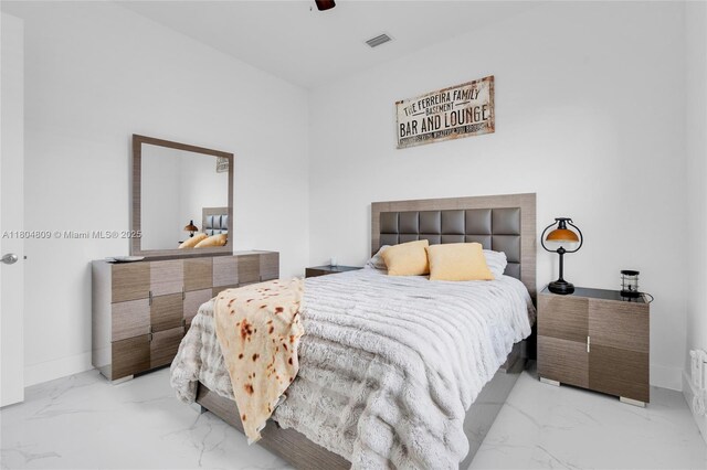 1020 Rush Ave, Lehigh Acres, FL 33972 - bedroom featuring marble tiled flooring, baseboards, and a ceiling fan