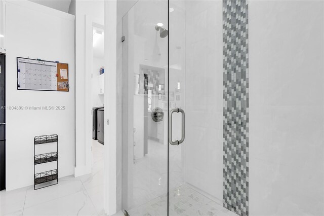 1020 Rush Ave, Lehigh Acres, FL 33972 - bathroom featuring a shower stall and marble finish flooring