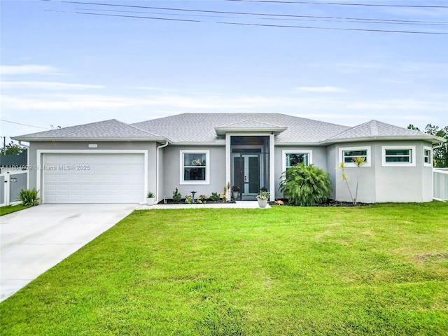 1020 Rush Ave, Lehigh Acres, FL 33972 - prairie-style house with french doors, a garage, driveway, a front lawn, and stucco siding