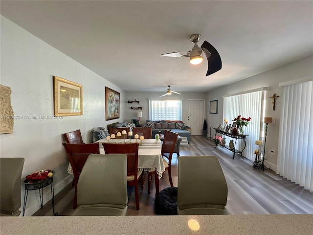 14367 SW 96th Ln, Miami, FL 33186 - dining space featuring a ceiling fan, wood finished floors, and baseboards