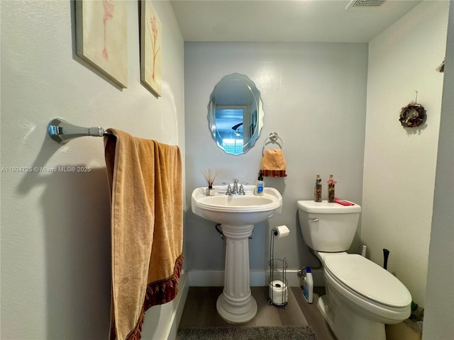 14367 SW 96th Ln, Miami, FL 33186 - bathroom with toilet and wood finished floors