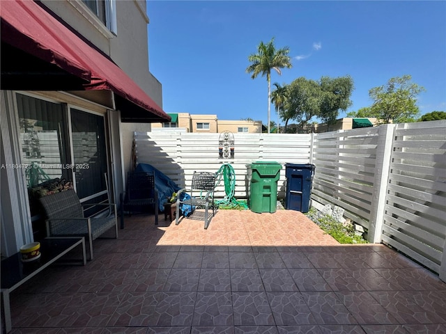 14367 SW 96th Ln, Miami, FL 33186 - view of patio featuring a fenced backyard