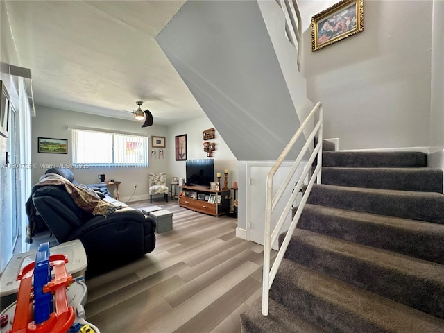 14367 SW 96th Ln, Miami, FL 33186 - living area with stairway, wood finished floors, and baseboards