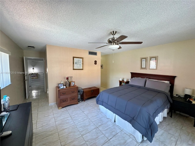 14367 SW 96th Ln, Miami, FL 33186 - bedroom featuring ceiling fan and a textured ceiling