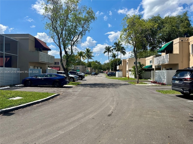 14367 SW 96th Ln, Miami, FL 33186 - view of asphalt road with a residential view