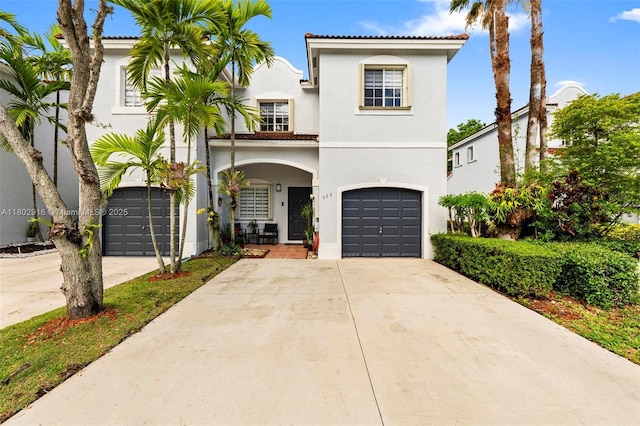 922 SW 148th Pl, Miami, FL 33194 - mediterranean / spanish home with an attached garage, stucco siding, concrete driveway, and covered porch