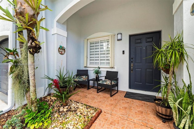 922 SW 148th Pl, Miami, FL 33194 - entrance to property featuring stucco siding and a porch