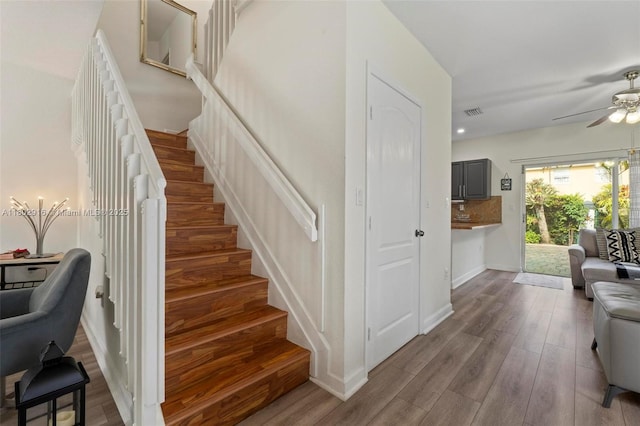 922 SW 148th Pl, Miami, FL 33194 - staircase featuring a ceiling fan, wood finished floors, baseboards, and recessed lighting