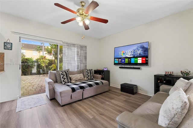 922 SW 148th Pl, Miami, FL 33194 - living room featuring wood finished floors, ceiling fan, and baseboards