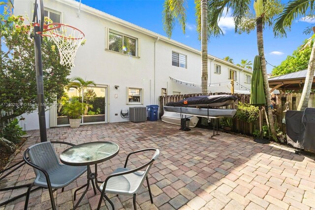 922 SW 148th Pl, Miami, FL 33194 - view of patio / terrace featuring central air condition unit