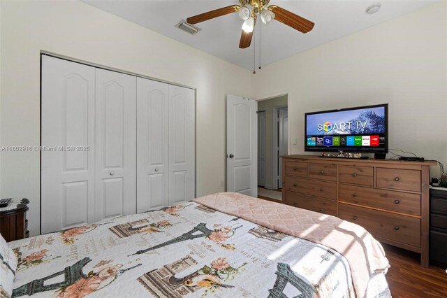 922 SW 148th Pl, Miami, FL 33194 - bedroom featuring a closet, dark wood-style floors, and a ceiling fan