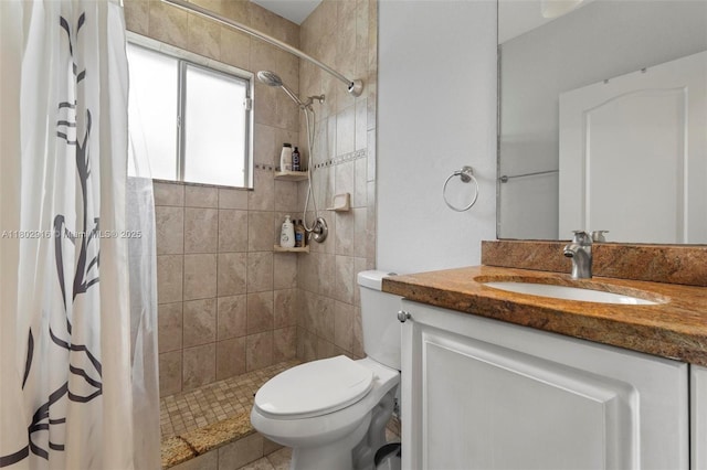 922 SW 148th Pl, Miami, FL 33194 - bathroom featuring toilet, a tile shower, and vanity