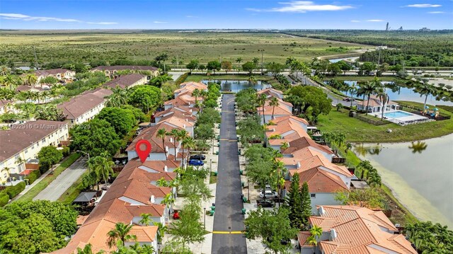 922 SW 148th Pl, Miami, FL 33194 - aerial overview of property's location featuring nearby suburban area and a nearby body of water