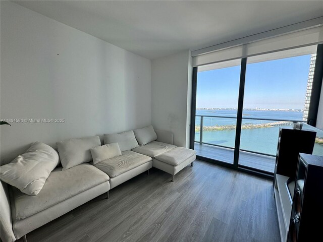 501 NE 31st St Unit 2903, Miami, FL 33137 - living area featuring floor to ceiling windows and wood finished floors