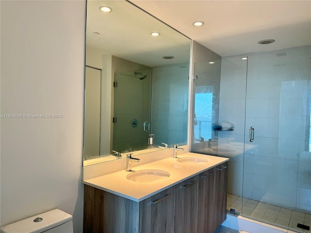 501 NE 31st St Unit 2903, Miami, FL 33137 - bathroom featuring a stall shower, recessed lighting, toilet, and double vanity