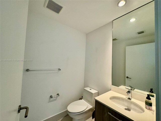 501 NE 31st St Unit 2903, Miami, FL 33137 - bathroom featuring recessed lighting, toilet, vanity, and baseboards