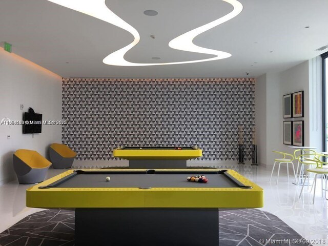 501 NE 31st St Unit 2903, Miami, FL 33137 - game room with an accent wall and billiards table