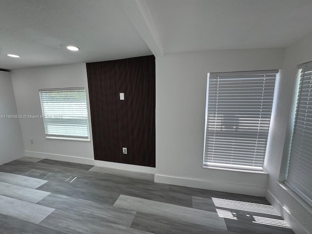 1794 NW 74th Ter, Miami, FL 33147 - empty room featuring baseboards, recessed lighting, and wood finished floors
