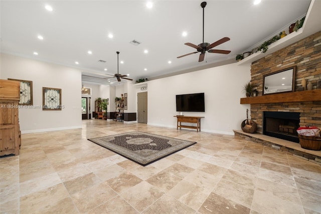 3324 Miller Ave, Lake Placid, FL 33852 - living area featuring a ceiling fan, recessed lighting, crown molding, a stone fireplace, and baseboards