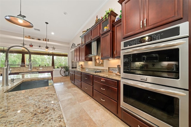 3324 Miller Ave, Lake Placid, FL 33852 - kitchen with stainless steel double oven, a sink, vaulted ceiling, extractor fan, and ornamental molding