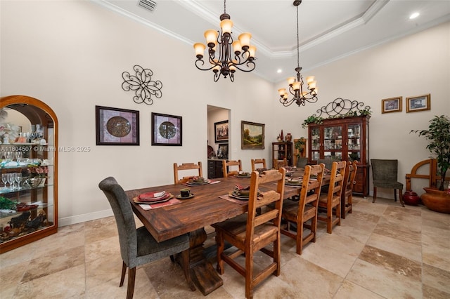 3324 Miller Ave, Lake Placid, FL 33852 - dining room with ornamental molding, a chandelier, a towering ceiling, baseboards, and recessed lighting