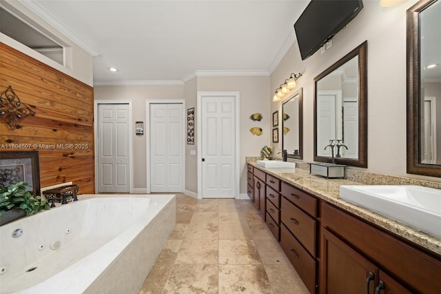 3324 Miller Ave, Lake Placid, FL 33852 - bathroom with ornamental molding, a jetted tub, double vanity, a closet, and recessed lighting