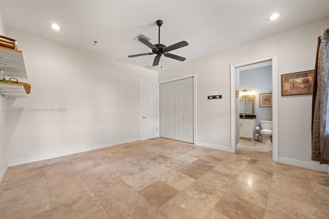 3324 Miller Ave, Lake Placid, FL 33852 - unfurnished bedroom featuring ensuite bath, baseboards, recessed lighting, ceiling fan, and a closet