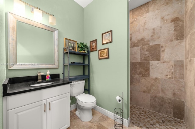3324 Miller Ave, Lake Placid, FL 33852 - bathroom featuring toilet, baseboards, tiled shower, vanity, and tile patterned flooring