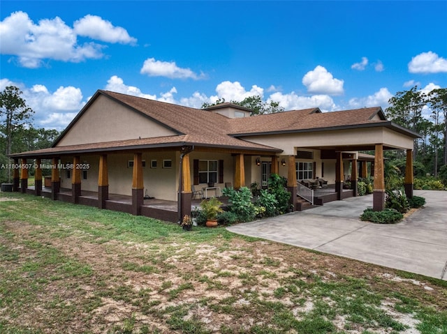3324 Miller Ave, Lake Placid, FL 33852 - back of property with stucco siding, central air condition unit, and a patio