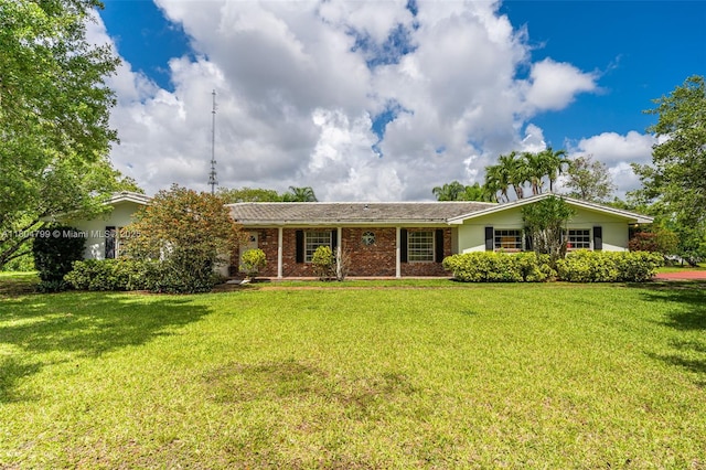 21800 SW 152nd Ave, Miami, FL 33170 - view of front facade with a front lawn and brick siding