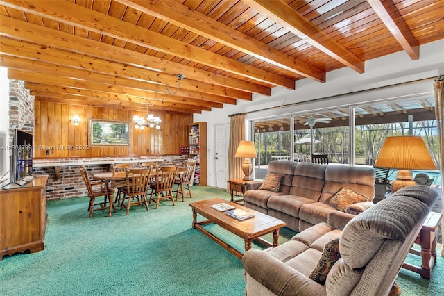 21800 SW 152nd Ave, Miami, FL 33170 - living area with carpet, a chandelier, beamed ceiling, wood ceiling, and wooden walls